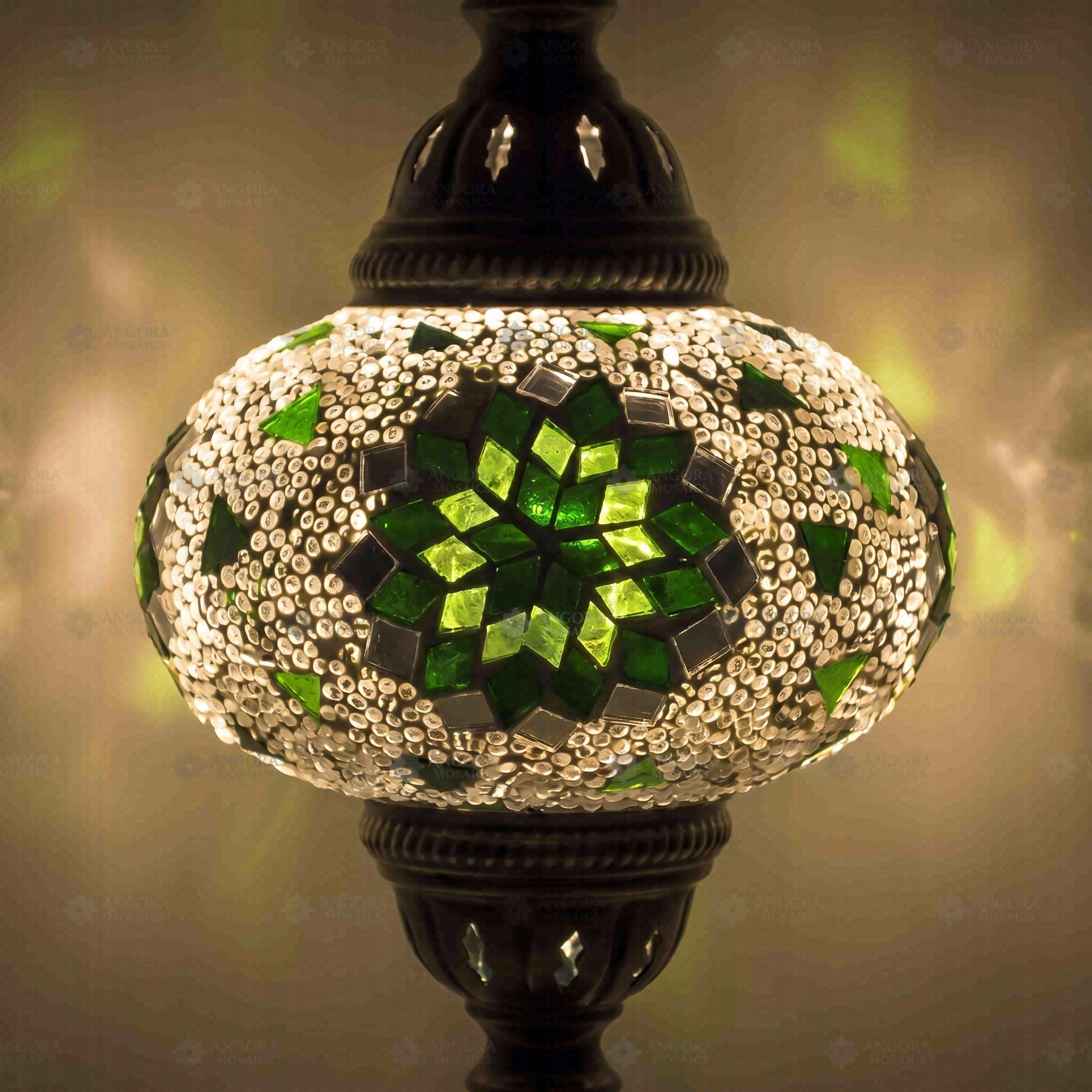 Lit close-up of mosaic glass globe — Green table lamp glowing (ENV MUN3055)