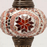 Close-up of Amber warm amber mosaic glass globe pattern — table lamp (ENV MUN3056)