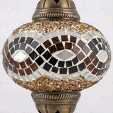 Close-up of Amber warm amber mosaic glass globe pattern — table lamp (ENV MUN3064)