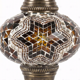 Close-up of Amber warm amber mosaic glass globe pattern — table lamp (ENV MUN3088)