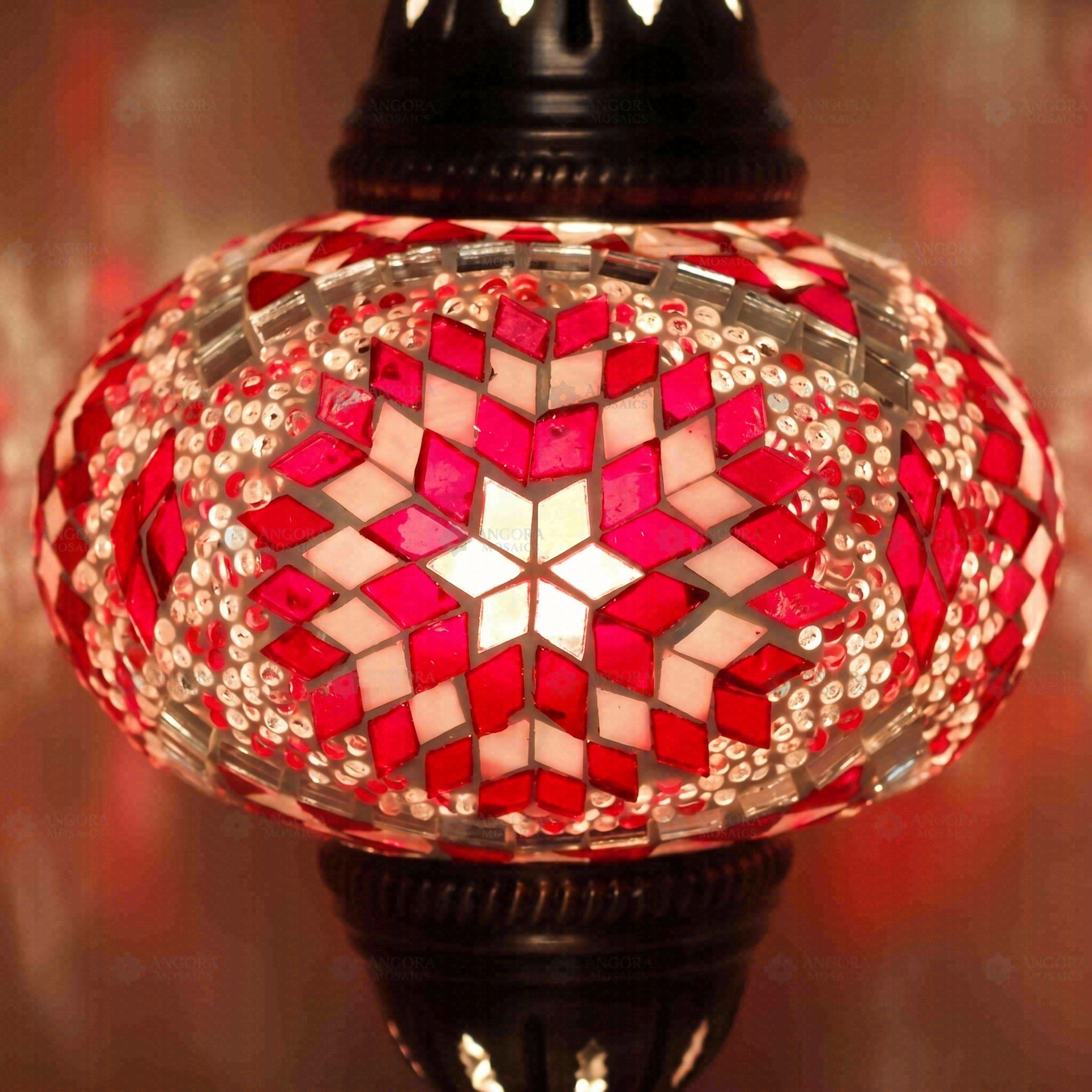 Lit close-up of mosaic glass globe — Red table lamp glowing (ENV MUN3090)