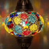 Lit close-up of mosaic glass globe — Multicolor table lamp glowing (ENV MUN3091)