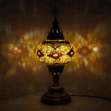 Amber Turkish mosaic table lamp illuminated, showing colorful light projection (ENV MUN3092)