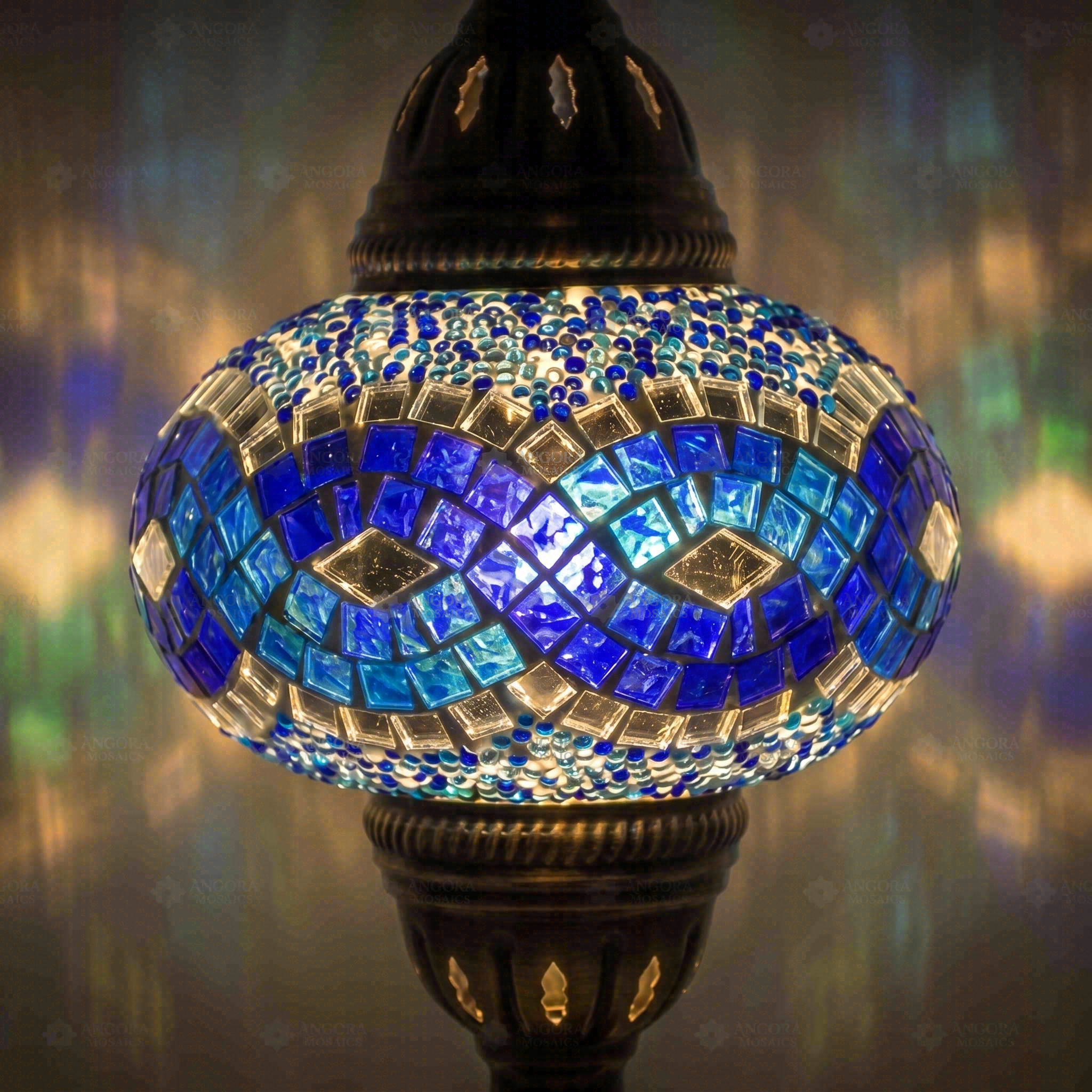 Lit close-up of mosaic glass globe — Blue table lamp glowing (ENV MUN3094)