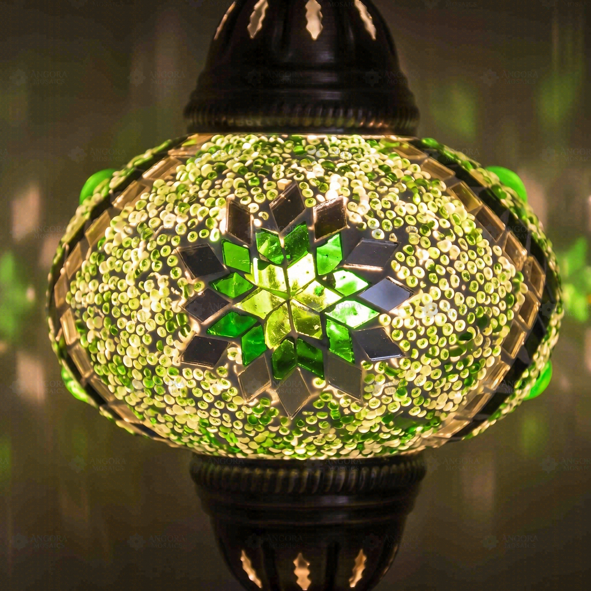 Lit close-up of mosaic glass globe — Green table lamp glowing (ENV MUN3096)