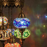 Lit close-up of mosaic glass globe — Multicolor chandelier glowing (ENV SLT5N3 (02-03-05-11-56))