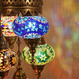 Lit close-up of mosaic glass globe — Multicolor chandelier glowing (ENV SLT5N3 (02-03-05-11-61))