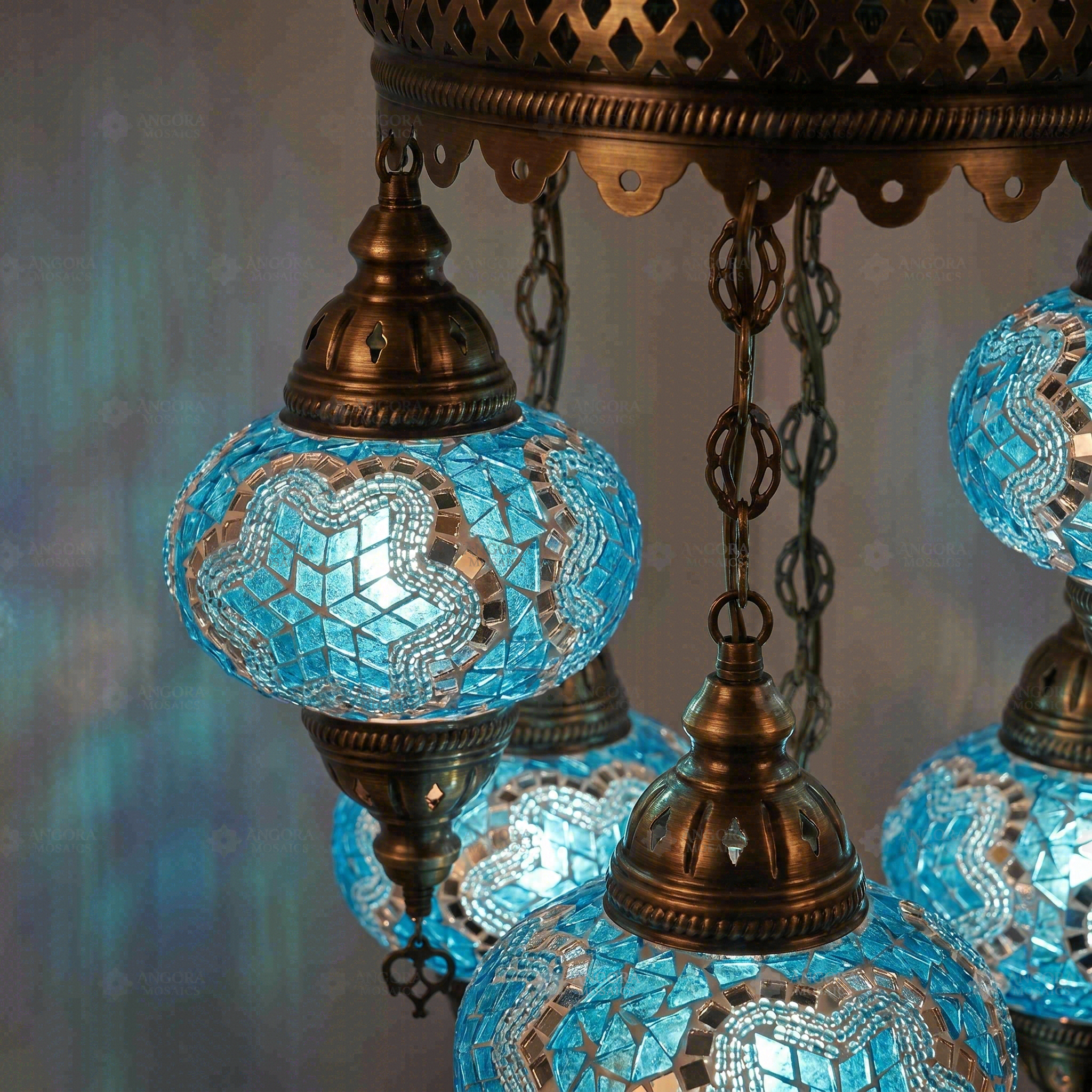 Lit close-up of mosaic glass globe — Blue chandelier glowing (ENV SLT5N3 (3016))