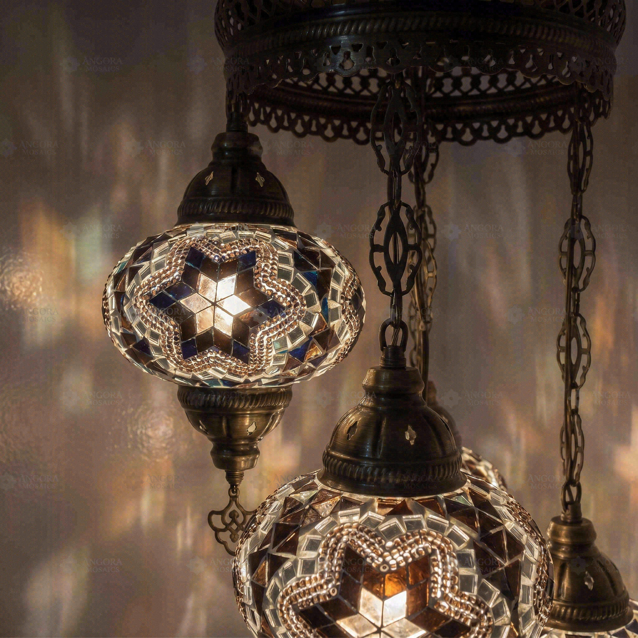 Lit close-up of mosaic glass globe — Clear chandelier glowing (ENV SLT5N3 (3019))