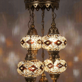 Lit close-up of mosaic glass globe — Clear chandelier glowing (ENV SLT5N3 (3092))