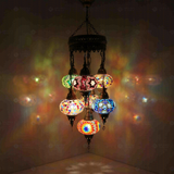 Multicolor Turkish mosaic chandelier illuminated, showing colorful light projection (ENV SLT7N3 (02-03-07-18-19-34-46))