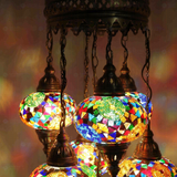 Lit close-up of mosaic glass globe — Multicolor chandelier glowing (ENV SLT7N3 (3001))