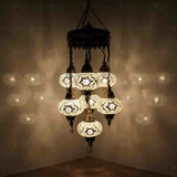 White Turkish mosaic chandelier illuminated, showing colorful light projection (ENV SLT7N3 (3015))