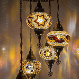 Lit close-up of mosaic glass globe — Warm Tones chandelier glowing (HLZ5N3 (63-64-67-88-89))