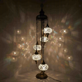 White Turkish mosaic floor lamp illuminated, showing colorful light projection (LMD5N3 (3022))