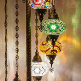 Lit close-up of mosaic glass globe — Multicolor floor lamp glowing (LMD9N3 (01-03-09-11-13-15-17-19-21))