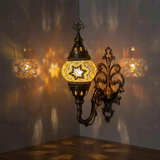 Amber Turkish mosaic wall sconce illuminated, showing colorful light projection (ENV APN1022)