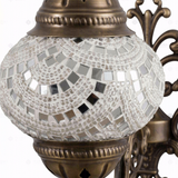 Close-up of White white glow mosaic glass globe pattern — wall sconce (ENV APN2001)