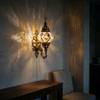 Amber warm amber Turkish mosaic wall sconce in styled room — handmade Moroccan wall sconce (ENV APN2025)