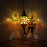 Multicolor Turkish mosaic wall sconce illuminated, showing colorful light projection (ENV APN3004)