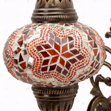 Close-up of Amber warm amber mosaic glass globe pattern — wall sconce (ENV APN3011)