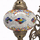 Close-up of Multicolor multicolor jewel mosaic glass globe pattern — wall sconce (ENV APN3014)