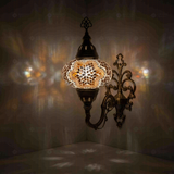 Warm Tones Turkish mosaic wall sconce illuminated, showing colorful light projection (ENV APN3019)