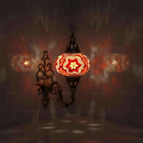 Red Turkish mosaic wall sconce illuminated, showing colorful light projection (ENV APN3025)