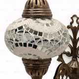 Close-up of White white glow mosaic glass globe pattern — wall sconce (ENV APN3036)