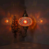 Red Turkish mosaic wall sconce illuminated, showing colorful light projection (ENV APN3056)