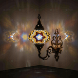 Warm Tones Turkish mosaic wall sconce illuminated, showing colorful light projection (ENV APN3063)