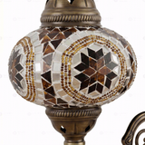 Close-up of Amber warm amber mosaic glass globe pattern — wall sconce (ENV APN3067)