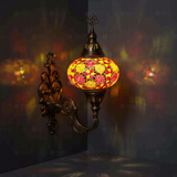 Amber Turkish mosaic wall sconce illuminated, showing colorful light projection (ENV APN3079)