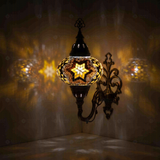 Amber Turkish mosaic wall sconce illuminated, showing colorful light projection (ENV APN3088)