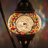 Lit close-up of mosaic glass globe — Multicolor table lamp glowing (ENV DVN1013)