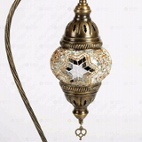 Close-up of Amber warm amber mosaic glass globe pattern — table lamp (ENV DVN1022)