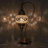 Clear Turkish mosaic table lamp illuminated, showing colorful light projection (ENV DVN1023)