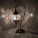 White Turkish mosaic table lamp illuminated, showing colorful light projection (ENV DVN2017)