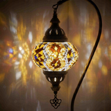 Lit close-up of mosaic glass globe — Warm Tones table lamp glowing (ENV DVN2025)