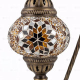 Close-up of Amber warm amber mosaic glass globe pattern — table lamp (ENV DVN2118)