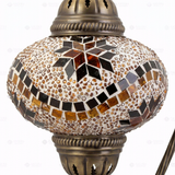 Close-up of Amber warm amber mosaic glass globe pattern — table lamp (ENV DVN3009)