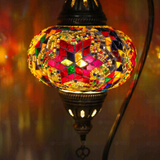Lit close-up of mosaic glass globe — Multicolor table lamp glowing (ENV DVN3017)