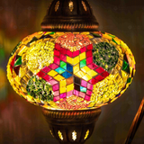 Lit close-up of mosaic glass globe — Multicolor table lamp glowing (ENV DVN3024)
