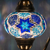 Lit close-up of mosaic glass globe — Blue table lamp glowing (ENV DVN3040)