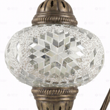 Close-up of Amber warm amber mosaic glass globe pattern — table lamp (ENV DVN3043)