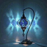 Blue Turkish mosaic table lamp illuminated, showing colorful light projection (ENV DVN3053)