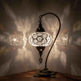 White Turkish mosaic table lamp illuminated, showing colorful light projection (ENV DVN3054)
