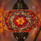 Lit close-up of mosaic glass globe — Red table lamp glowing (ENV DVN3056)
