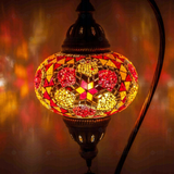 Lit close-up of mosaic glass globe — Amber table lamp glowing (ENV DVN3079)