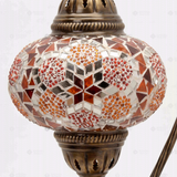 Close-up of Amber warm amber mosaic glass globe pattern — table lamp (ENV DVN3079)